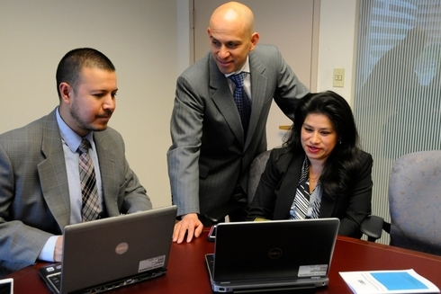 Persons talking in a meeting office - Code for dev - Inter American Development Bank - IDB